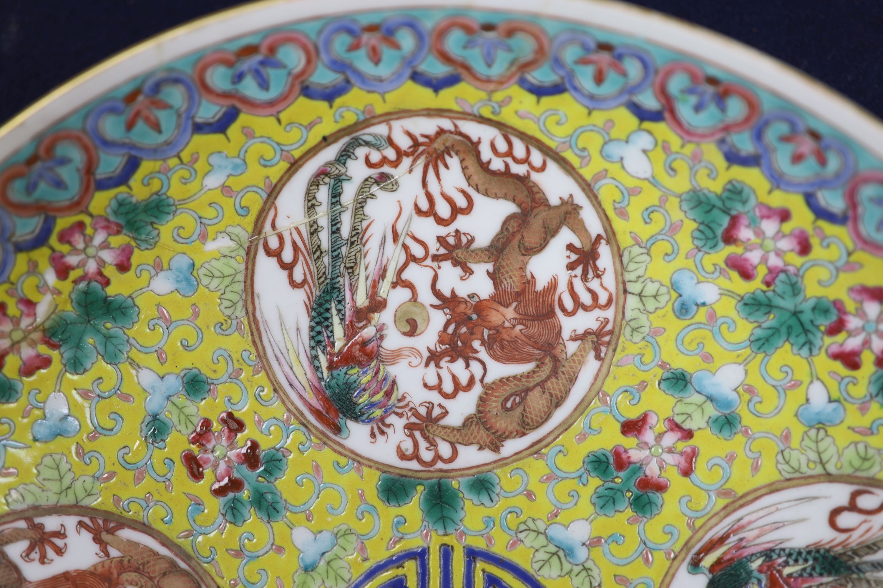 Two Chinese blue and white vases and a dish, together with a famille rose dish, tallest 28cm